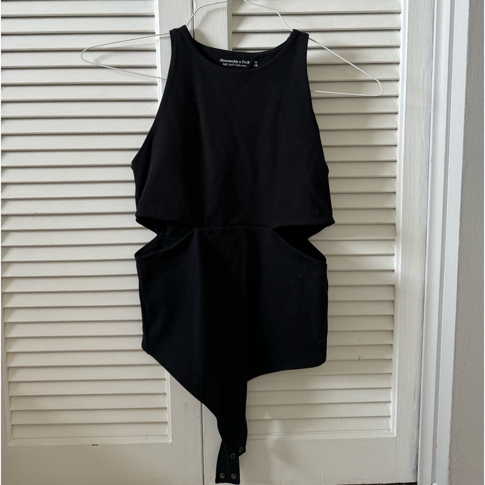 Black high neck body suit with cutouts on the sides